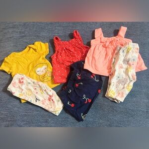 Bundle of Newborn Outfits by Carter’s